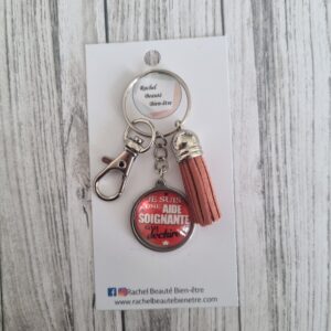 Porte-clef "Je suis une aide soignante qui déchire"